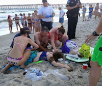 MEDIC SAVE VICTIM WITH BOOGIE BOARD STRING